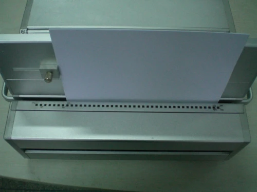 Electronic punching machine with interchangeable dies