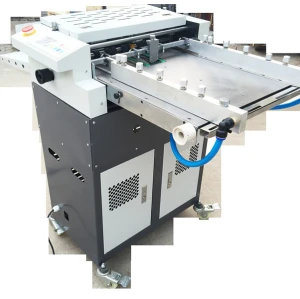 Automatic creasing and perforating machine with half cutting