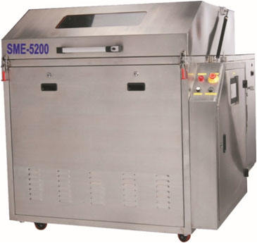 Wave solder pallet cleaning machine removing solder paste from pallets and carriers