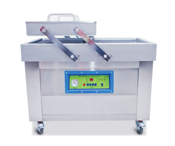 Vacuum packer for moisture barrier bagging of SMD reels