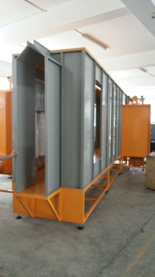 Powder spray booth and cabinet