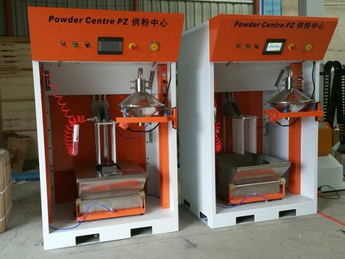 Automatic vibrating powder feed center for fast color change