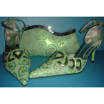 high heeled shoes and matching bags