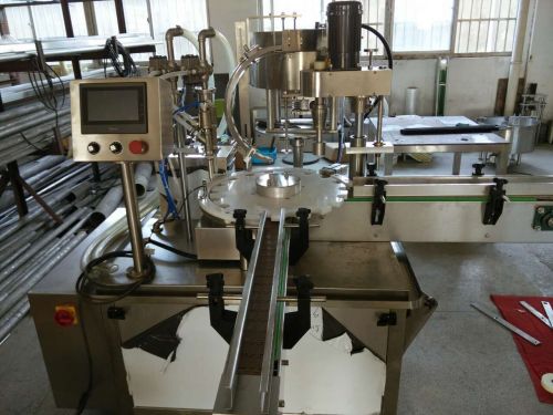 Automatic filling and capping machine