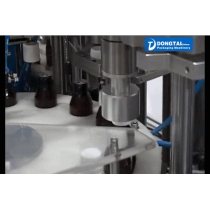 Automatic small glass bottle liquid filling capping and labeling machine