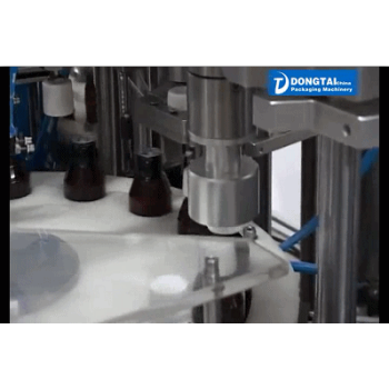 Automatic small glass bottle liquid filling capping and labeling machine