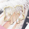 E-5496 Golden Hollow Face Pearl Novelty Ladies Earrings Party Earrings