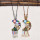 N-8256 New Retro Ethnic Style Handmade Acrylic Two Color Crescent Pendant For Women's Fashion Tassel Necklace