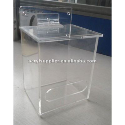 Clear acrylic holder box hanging on the wall