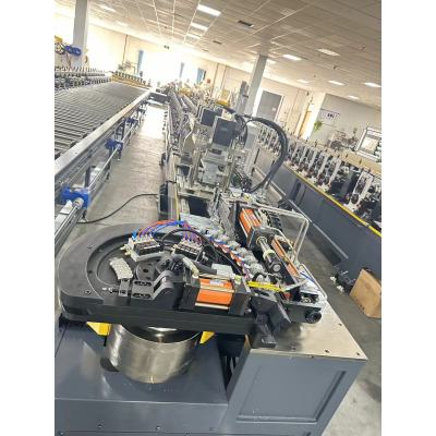 Sectional door track machine with automatic curve bending