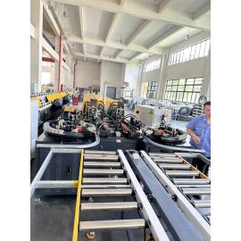 Sectional door track machine with automatic curve bending