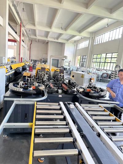 Sectional door track machine with automatic curve bending