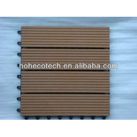 Interlocking wood plastic composite deck tiles