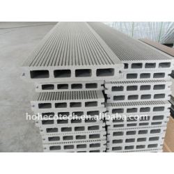 新しく環境に優しく物質的なwpcの木製のプラスチック合成のdeckingはビニールのdeckingをタイルを張る