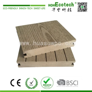 Decorative wood plastic composite decking material