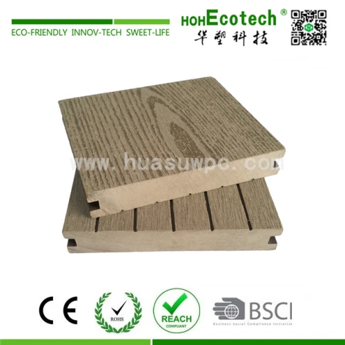 Decorative wood plastic composite decking material