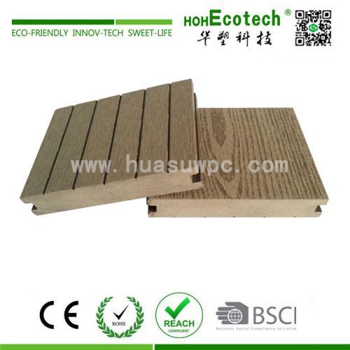 Decorative wood plastic composite decking material