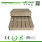 Decorative wood plastic composite decking material
