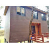 Wooden house with wpc composite wall cladding/decking/railing