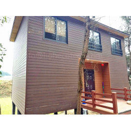 Wooden house with wpc composite wall cladding/decking/railing