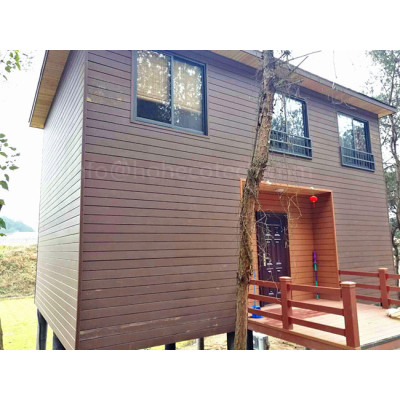Wooden house with wpc composite wall cladding/decking/railing