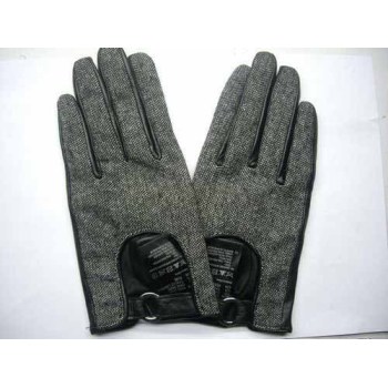 FABRIC WITH BLACK LEATHER GLOVES