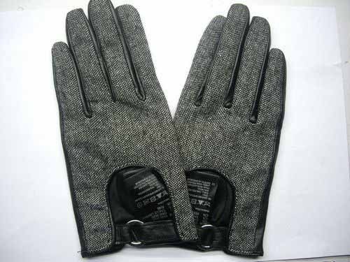 FABRIC WITH BLACK LEATHER GLOVES
