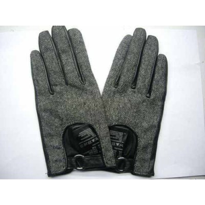 FABRIC WITH BLACK LEATHER GLOVES