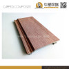 Wood plastic composite capped wall cladding with brushing surface