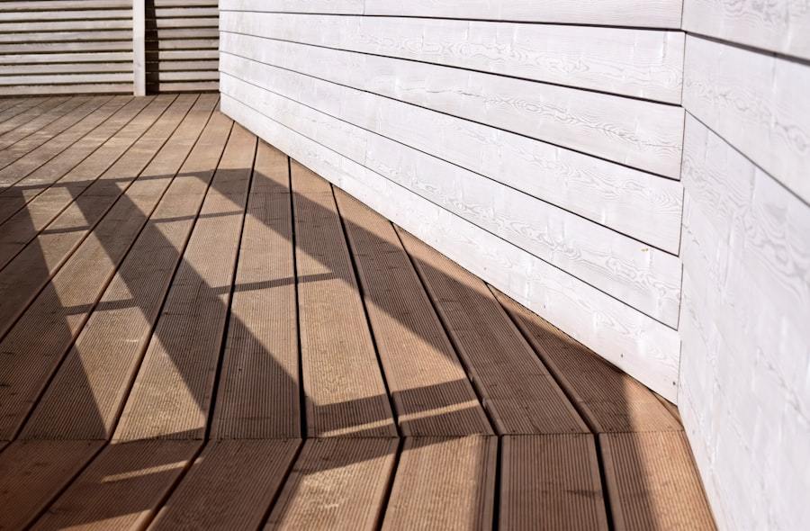 Person standing on a wooden deck