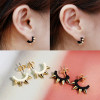 [ Free Shipping] New Hot European And American Retro Fashion Personality Cool The Tapered Black White Rivets Earrings