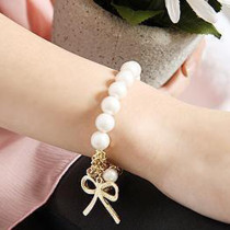 [Free Shipping]The HL04201 Korean of exquisite jewelry wholesale selling pearl gold bow bracelet 2012 new 28g