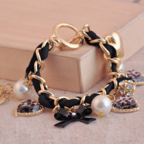 [Free Shipping]HL09401 European and American jewelry diamond bow leopard peach heart pearl bracelet 28g