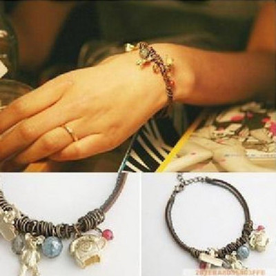 [Free Shipping]The HL10601 Korean jewelry female retro pendant Winnie the airplane phone the gem leather cord bracelet 13g