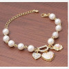 [Free Shipping] Over drilling the D word peach heart flowers Mageweave pearl multi-element bracelet