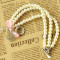 [Free Shipping]Pink bow diamond the antiwar multilayer pearl bracelet three pearl bracelet