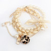 [Free Shipping] Fashion woven multi-layer pearl bow bracelet (beige)