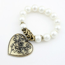 [Free Shipping]Fashion Bracelet - carved peach heart pearl bracelet