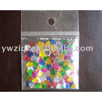 Heart-shaped color table confetti for wedding celebration