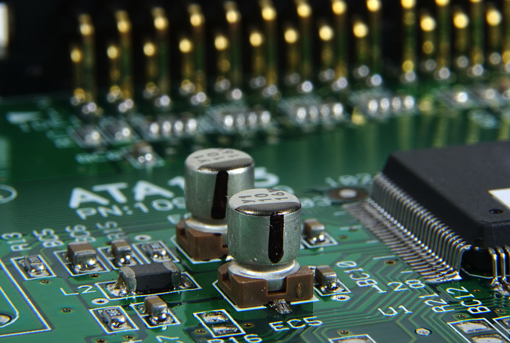 the difference between a printed circuit board and an integrated circuit