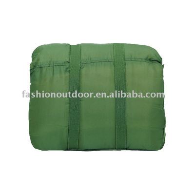 Dark green military mummy sleeping bag