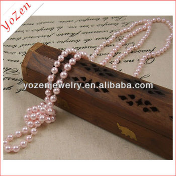 Lovely pink color costume pearls necklace