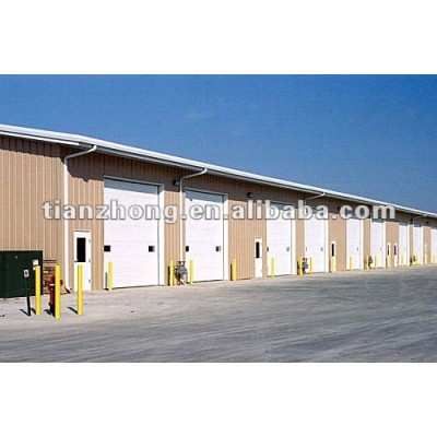 Steel Structure Metal Warehouse with Cladding and Rolloer Door