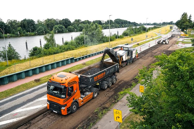 Asphalt distributor truck on road construction site