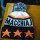 knitted pattern beanie hat with pompoms