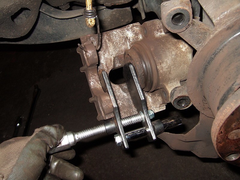 if you are piston brake,use brake piston tools to reset