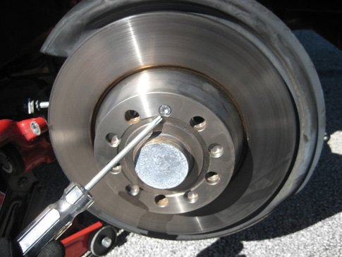 Special torx head bits or hex keys may be required to remove bolts which secure brake rotors in place.