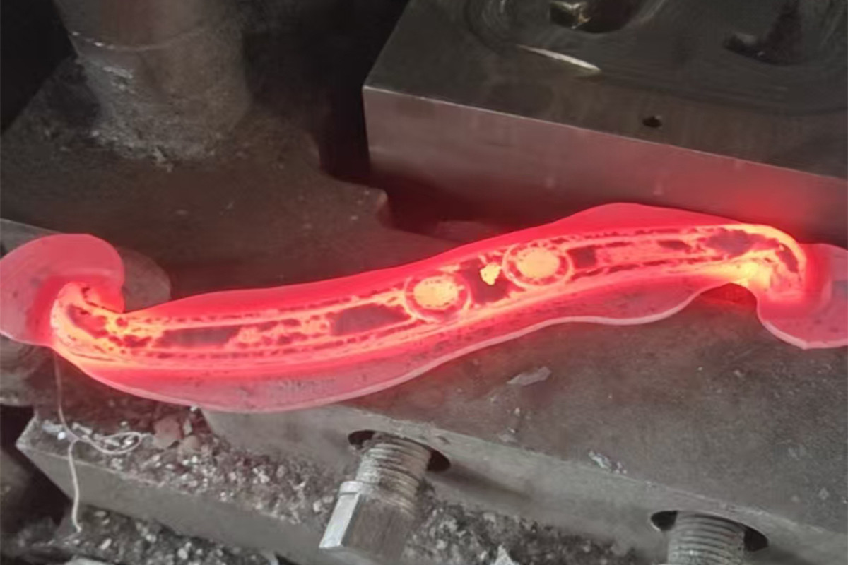 Red hot 40Cr steel being drop forged - prevents structural fracture in bearing pullers