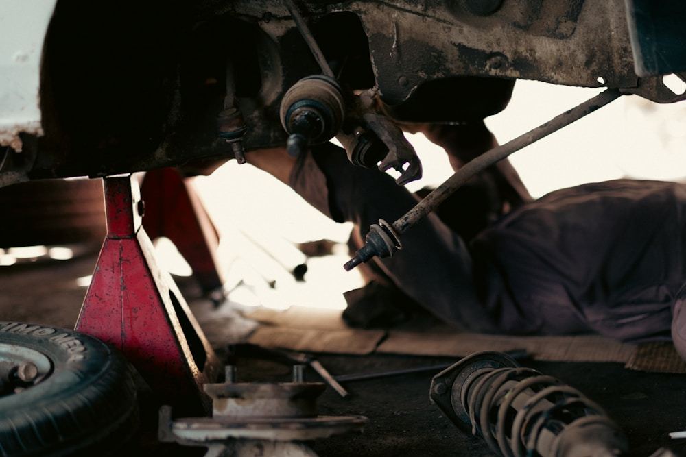 Undercar repair workspace with access around mechanical components