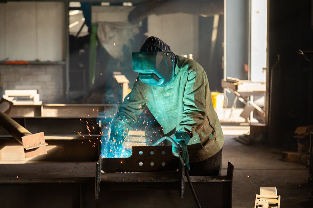 Industrial workshop work demonstrating controlled safety practices